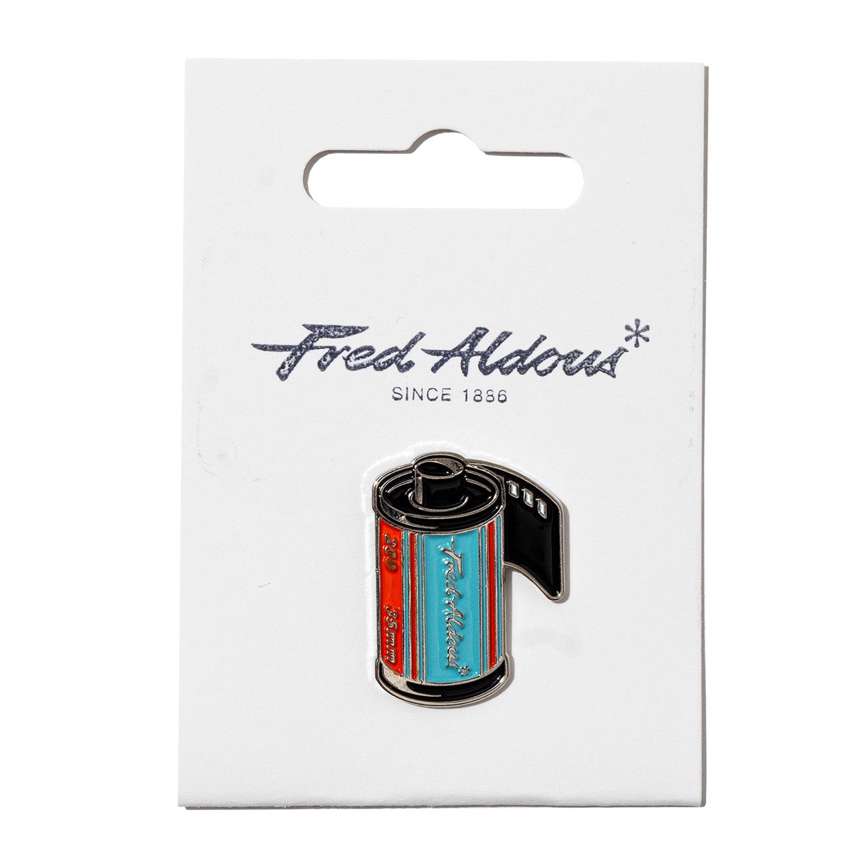 Fred Aldous Film Pin Badge Turquoise Orange